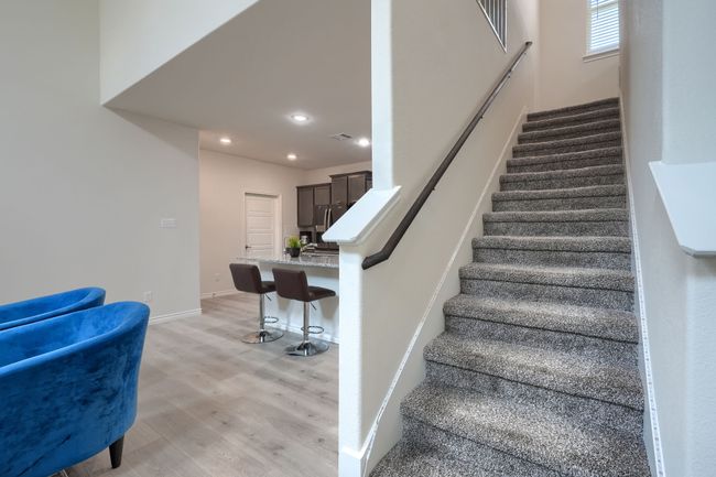 Stairs featuring wood finished floors, recessed lighting, and baseboards | Image 22