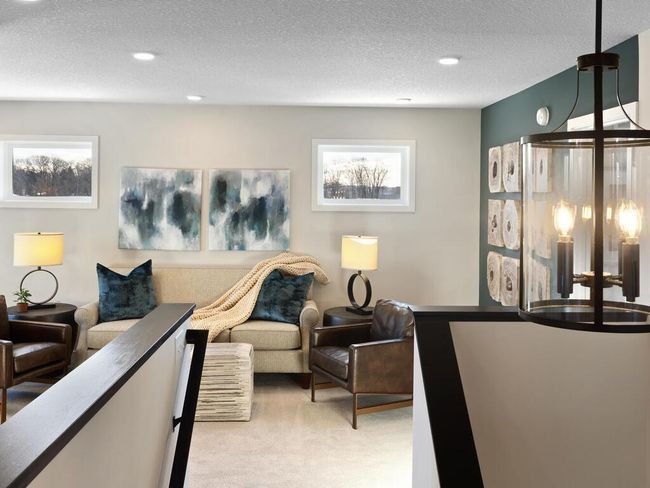 At the top of the stairs, you'll find a versatile loft space, perfect for a cozy reading nook, home office, or play area – offering endless possibilities to suit your lifestyle. | Image 19