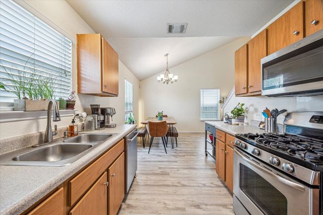 Large window over the sink brings in natural light | Image 8