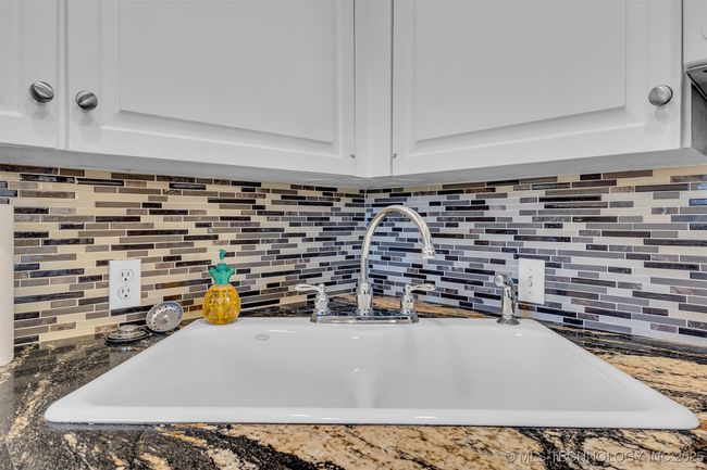 Granite counter with updated backsplaks | Image 7