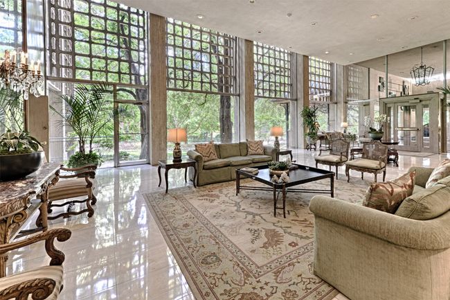 3525 lobby featuring a high ceiling, expansive windows, and recessed lighting | Image 25