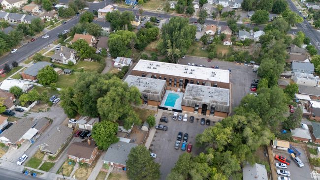 Aerial view of property's location with nearby suburban area | Image 12