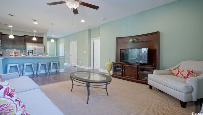 Living room featuring ceiling fan, light wood-type flooring, recessed lighting, and baseboards | Image 12