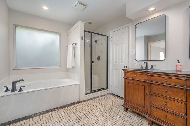 Primary bath with garden tub, separate shower, large walk-in closet | Image 19