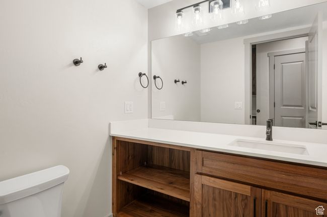 Bathroom with toilet and vanity | Image 25