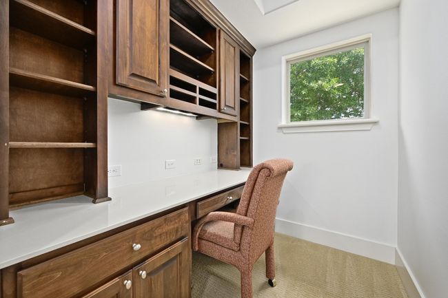 Carpeted office with built in study area | Image 18