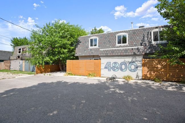 Front of property featuring roof and brick siding | Image 5