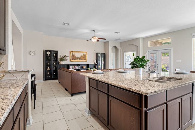 Open Concept living- prep dinner while still connecting with family. Island large enough for 7 bar stools! | Image 5