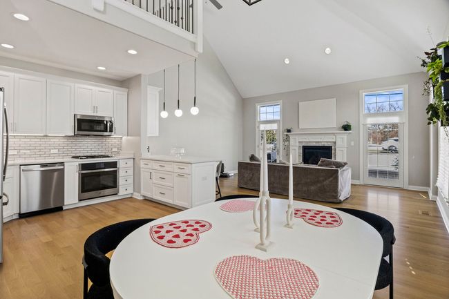 Open Concept to Kitchen and Living Room w/Gas Fire | Image 5
