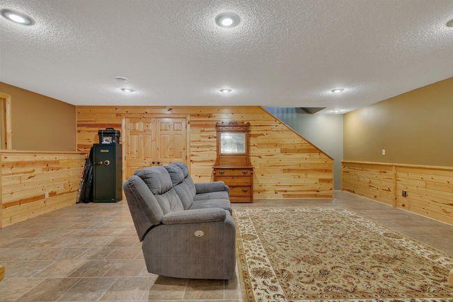 Family room with knotty pine | Image 22