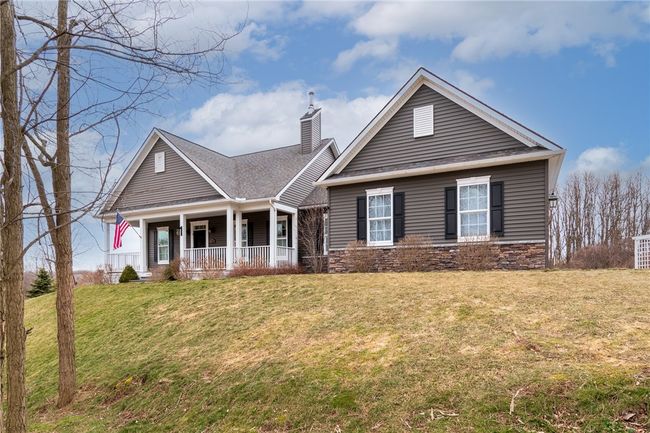 Built in 2014 with a full walk out basement- gravity drain keeps the foundation dry! | Image 49