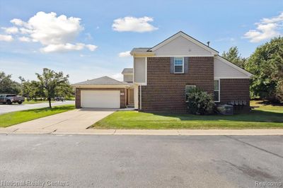 8777 Columbia Circle, Condo with 3 bedrooms, 2 bathrooms and null parking in Canton Twp MI | Image 2