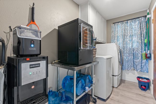 Oversized Laundry Room with space for Full-Size washer and dryer | Image 18