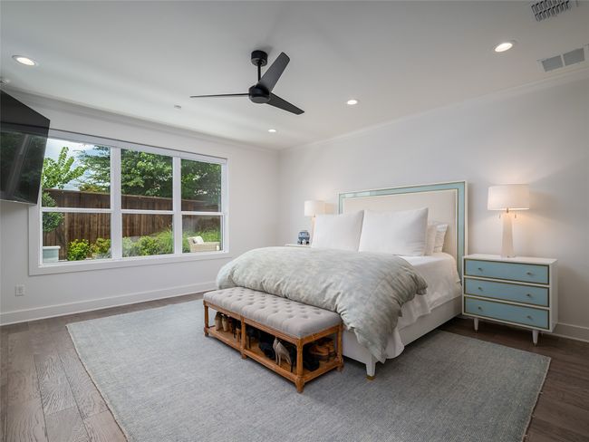 Bedroom with ornamental molding, recessed lighting, a ceiling fan, and dark wood-type flooring | Image 16
