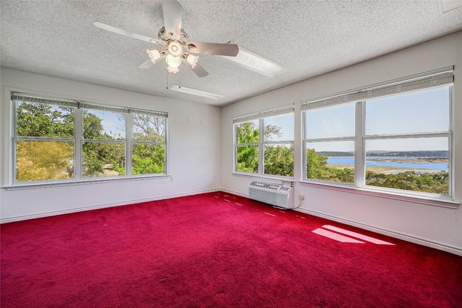Let's head upstairs to the 2nd floor apartment/guest quarters that has a separate entrance. Oversized, abundance of windows, amazing views! | Image 17