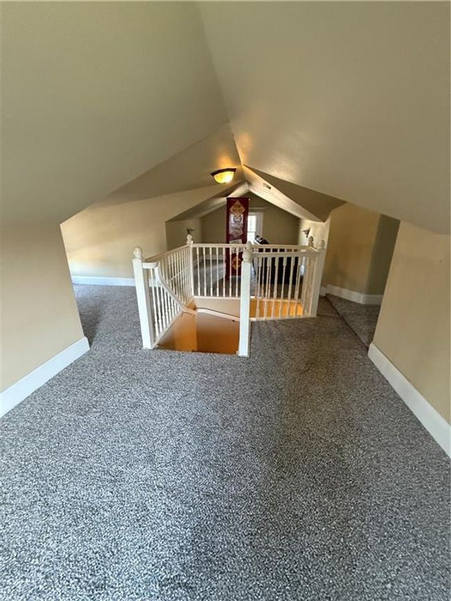 Bonus room with baseboards and lofted ceiling | Image 19