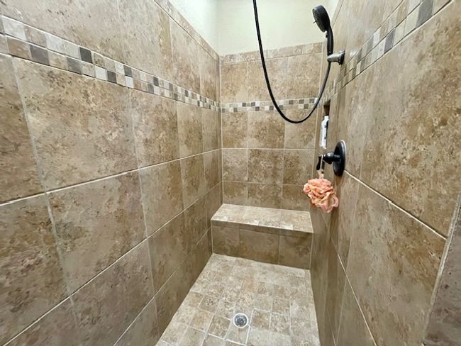 Walk-in tile shower with bench | Image 12