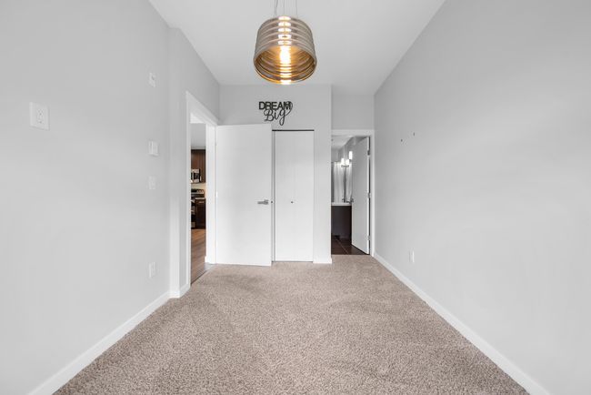 Unfurnished bedroom with carpet and baseboards | Image 34