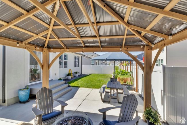 View of patio / terrace with a gazebo and an outdoor fire pit | Image 31