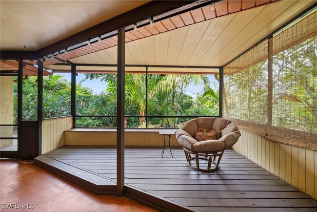 View of unfurnished sunroom | Image 26