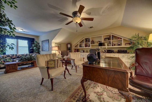 The home office on the upper floor is grand in size and style and could easily be a gameroom or sixth bedroom. There is a closet to the left of this perspective. | Image 35