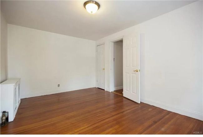 Empty room with dark hardwood / wood-style floors | Image 11