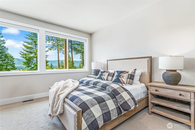 This private haven combines comfort and style with stunning natural beauty right outside your window | Image 17