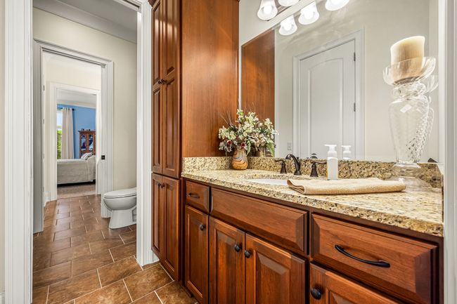 A Jack-and-Jill bathroom is a practical and stylish solution for shared spaces, often featuring two entrances, typically from adjoining bedrooms. This design not only maximizes privacy but also enhances convenience for multiple users. T | Image 49