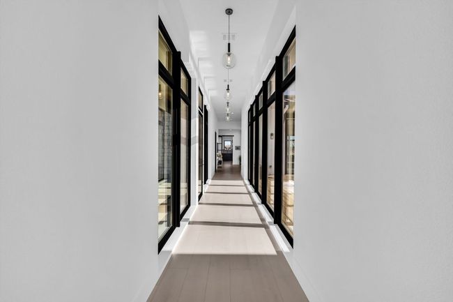 Corridor featuring hardwood floors | Image 8