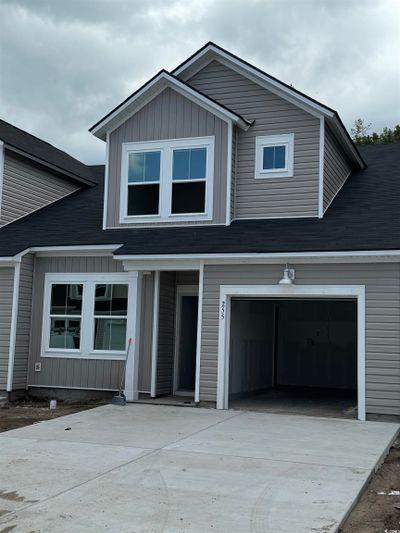 View of front of home featuring a garage | Image 1