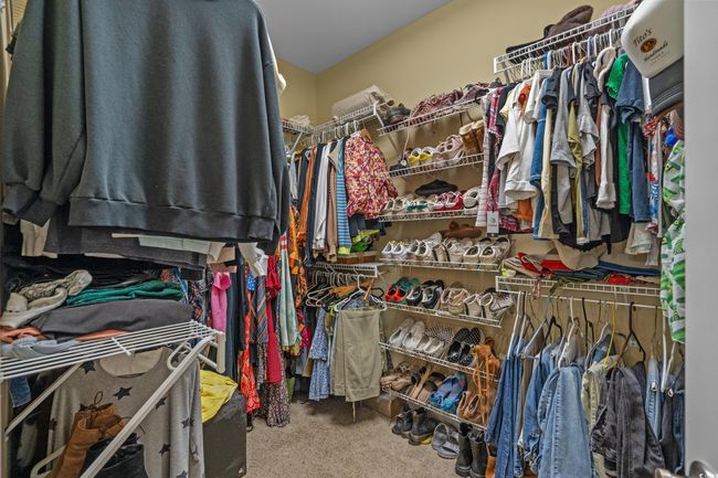 Walk in closet with carpet | Image 29