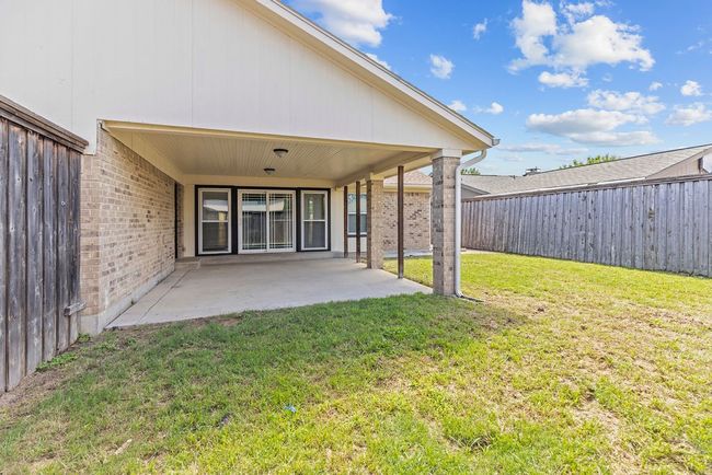 Back of house featuring a patio area and brick siding | Image 5