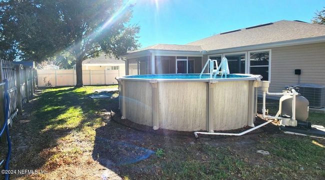 11775 Blueberry Ln, House other with 3 bedrooms, 2 bathrooms and null parking in MACCLENNY FL | Image 46