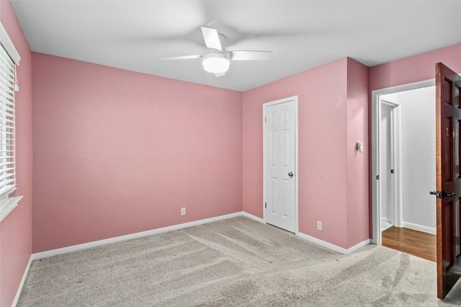 Bedroom 3 is large and spacious and offers a walk in closet | Image 30