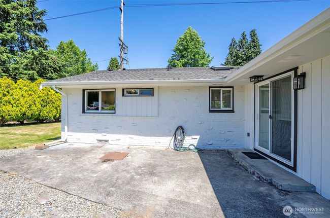 Large patio located out back, is just waiting for your Summer BBQ's and Activities | Image 21