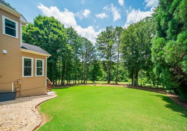 2521 Wood Creek Ct, House other with 5 bedrooms, 4 bathrooms and null parking in Dacula GA | Image 4
