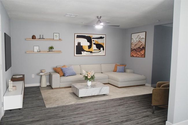 Virtually staged living area. - The next photo is the same room. | Image 5