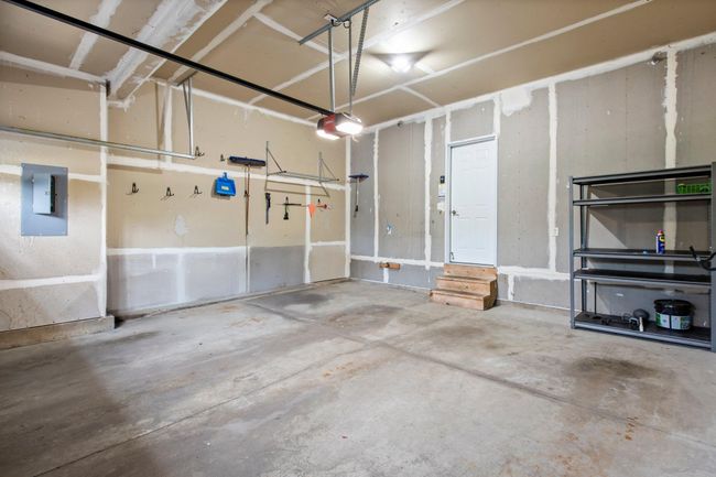 Spacious 2 car attached garage and with some extra space on the left side. | Image 47