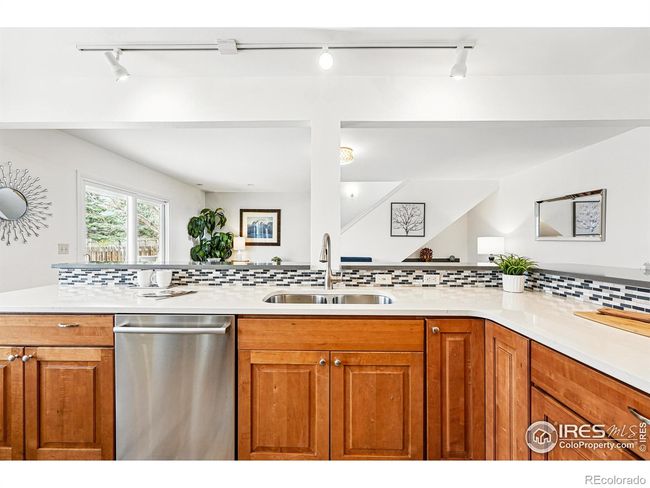 under counter sink for easy clean up and a raised wrap around bar | Image 8