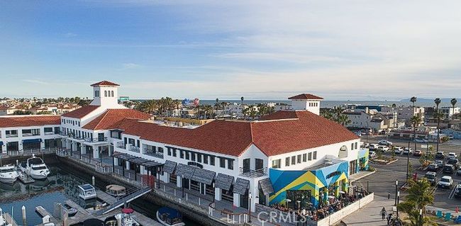 Take a leisurely stroll through Peters Landing, where you’ll find local shops, restaurants, and beautiful views of the harbor. | Image 72