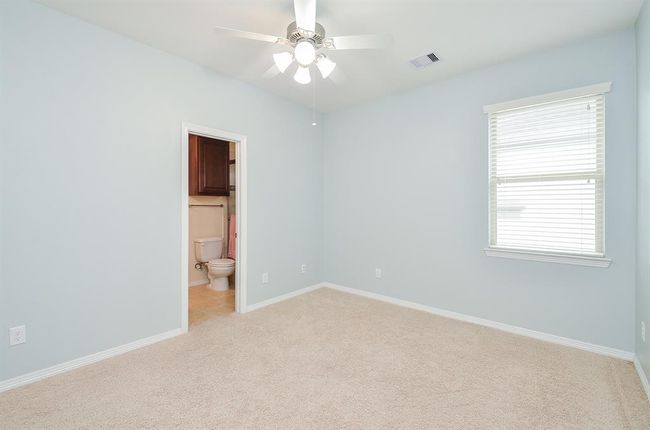 Another secondary bedroom upstairs with private bathroom. | Image 30