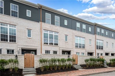 Luxury brick and hardieplank townhome located in walking distance to shopping, etc. | Image 3