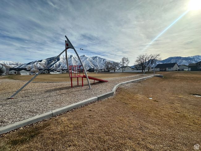Community playground with a mountain view | Image 9
