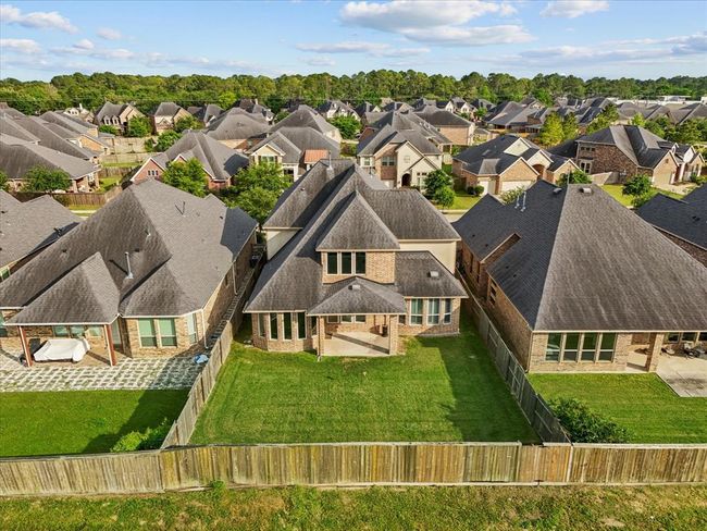 Aerial view of the back of the home | Image 37