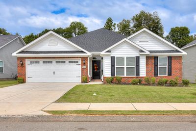 Ranch style home with 4 bedrooms and 2 baths. | Image 1