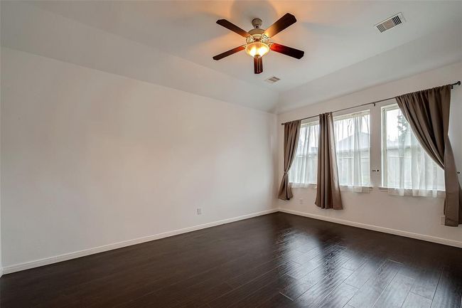 Huge Primary with wall of windows to back yard | Image 10