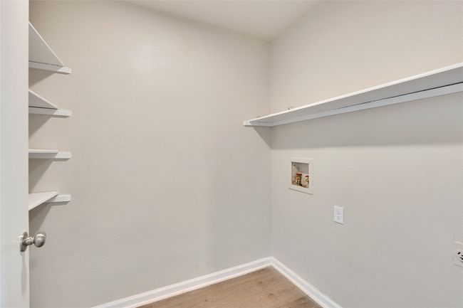 Laundry Room inside unit off of kitchen. | Image 10