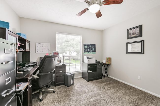 Fourth bedroom currently being used as a home office. | Image 18
