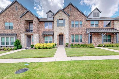 View of front of house featuring a front yard and a balcony | Image 2