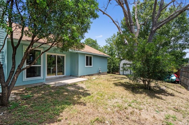 View of yard featuring a shed and a patio​​‌​​​​‌​​‌‌​‌‌​​​‌‌​​‌‌​‌​​​​​‌ area | Image 25